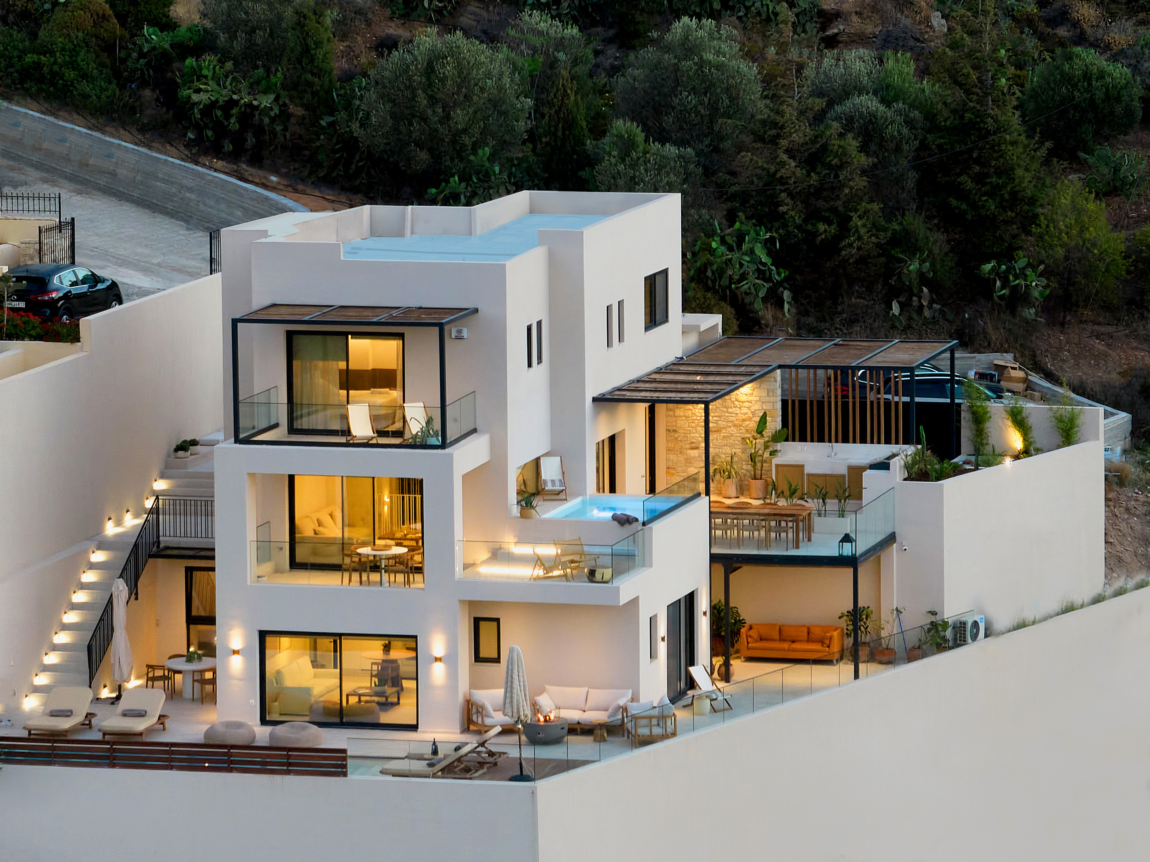 The Nook Villa at dusk with architectural lighting on
