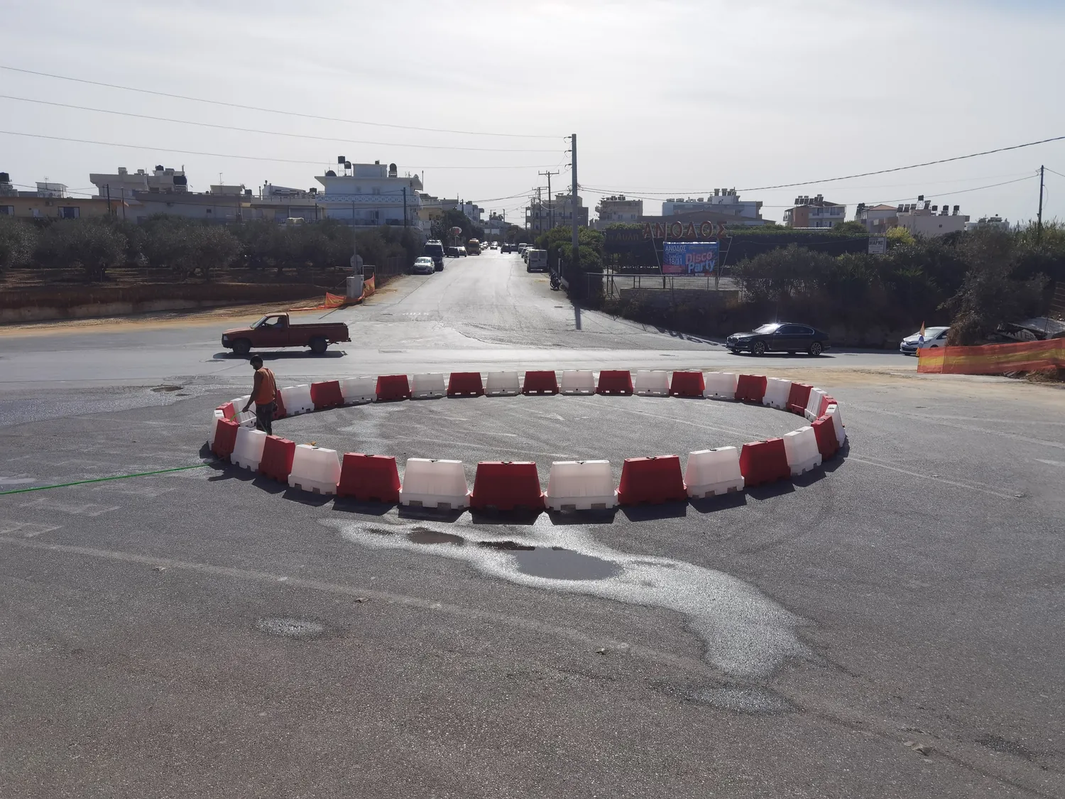 The old junction in November 2023 with the roundabout marked out provisionally in red and white plastic barriers