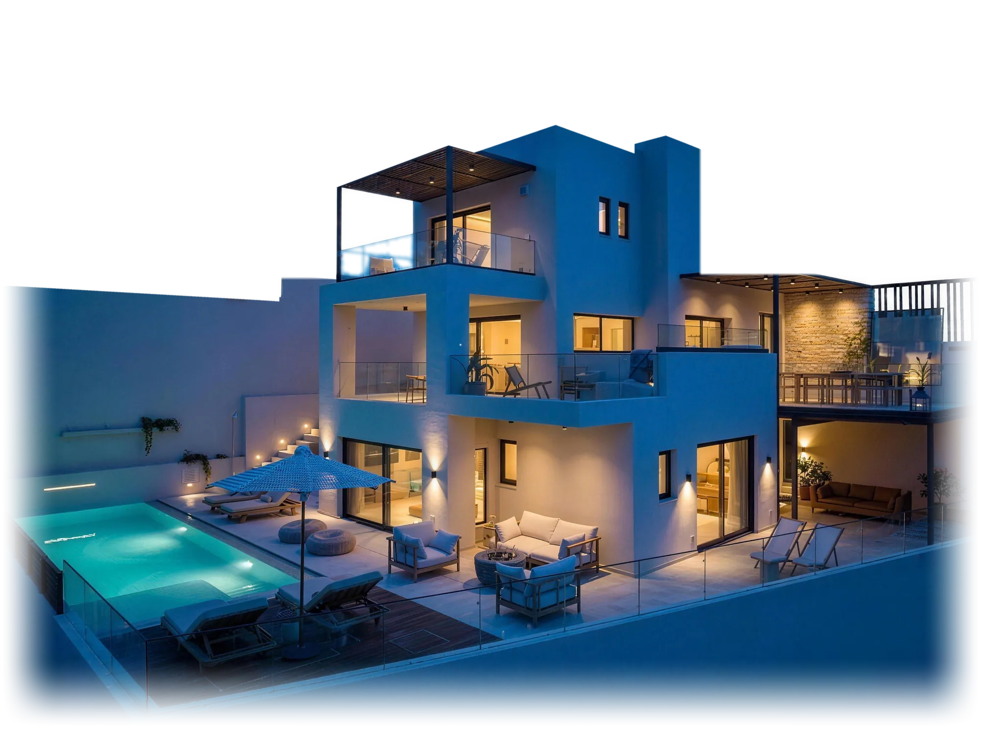 The Nook Villa at dusk — interior lights glowing through the glass, illuminated pools