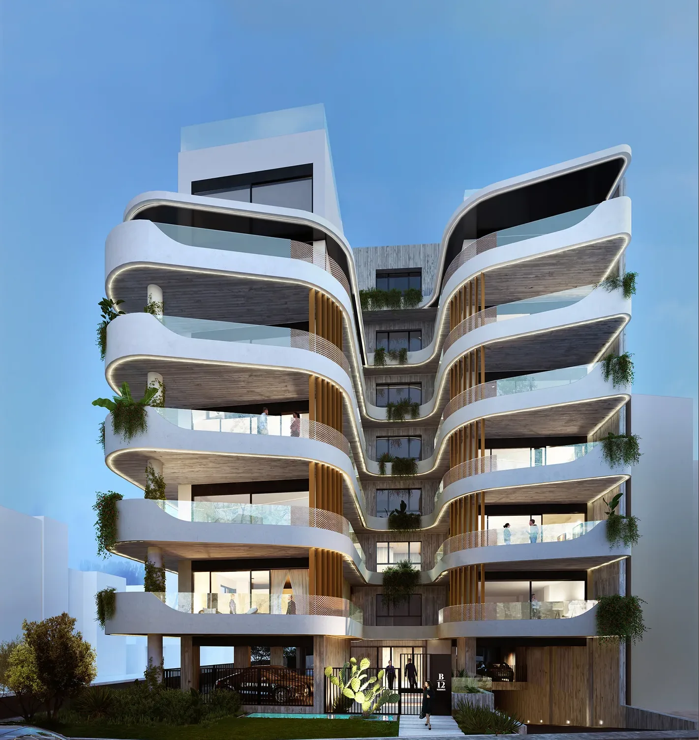 B12 Residences apartment building at dusk in Mastabas, Heraklion — curved white balconies by Lydakis Construction