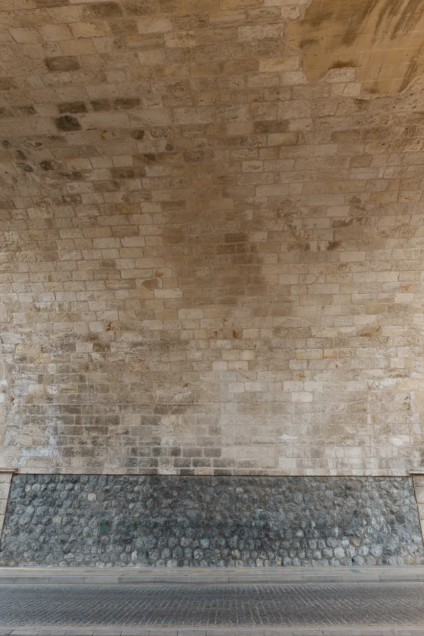 The masonry face beneath the arch, showing the extent of the stonework