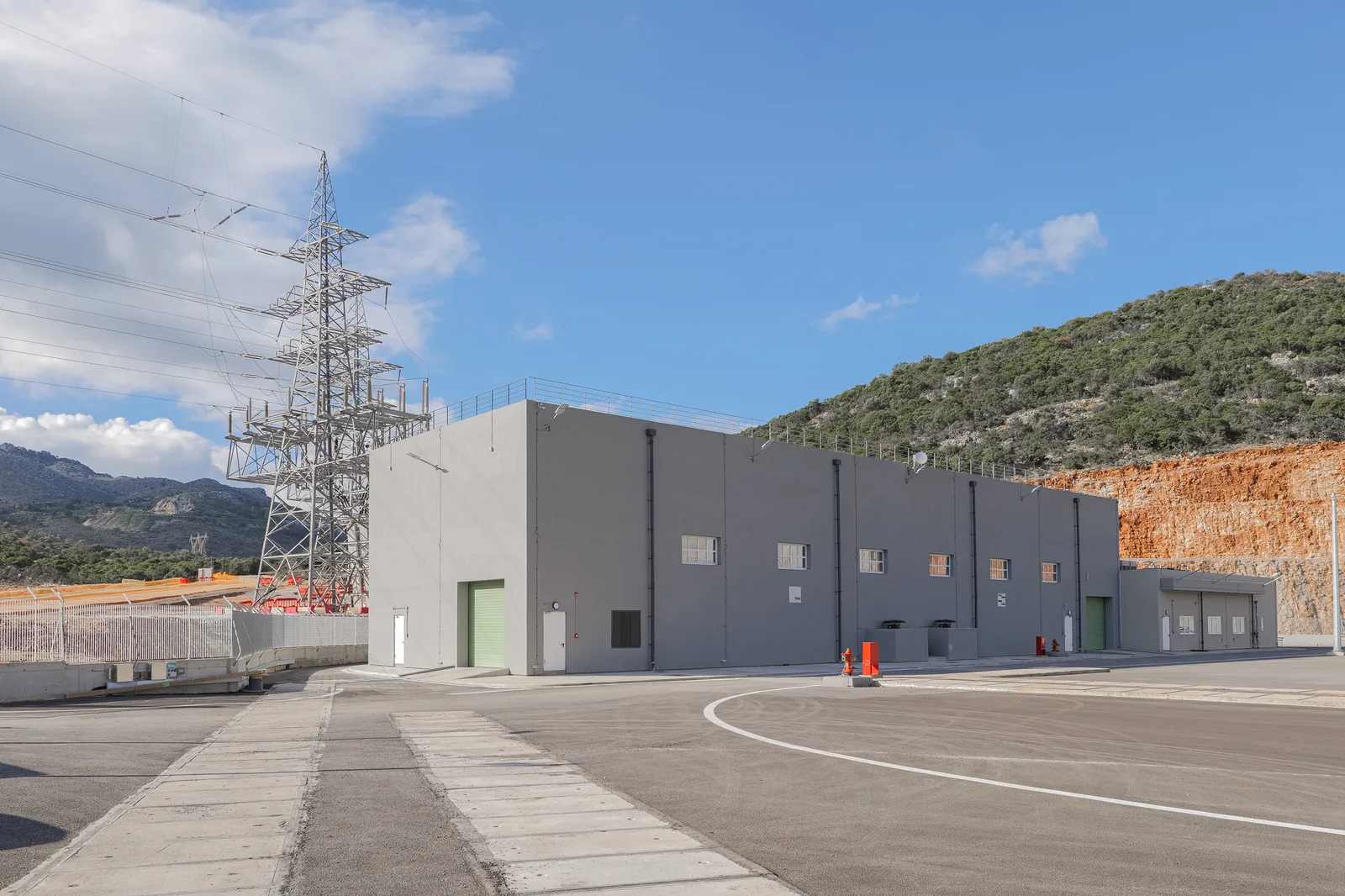 Converter hall elevation with transmission towers behind
