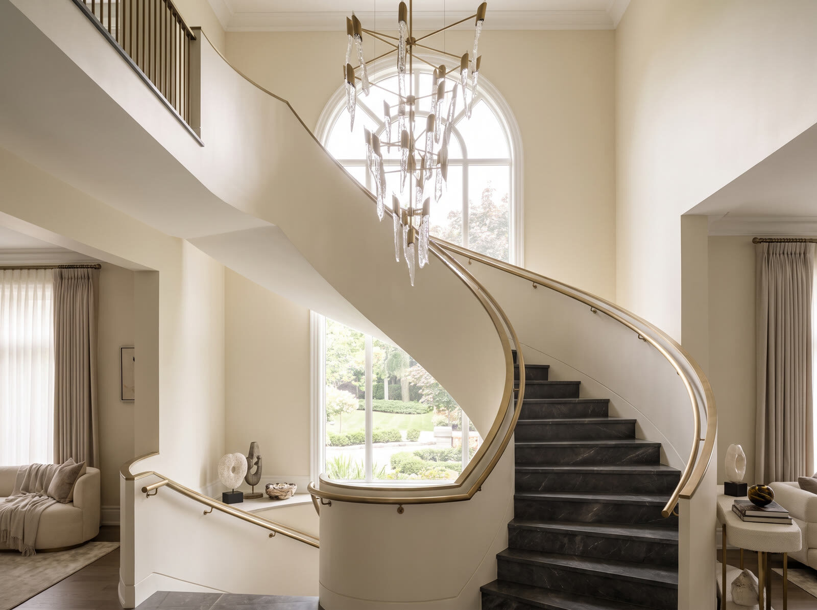 Elegant curved staircase in a luxury Markham estate