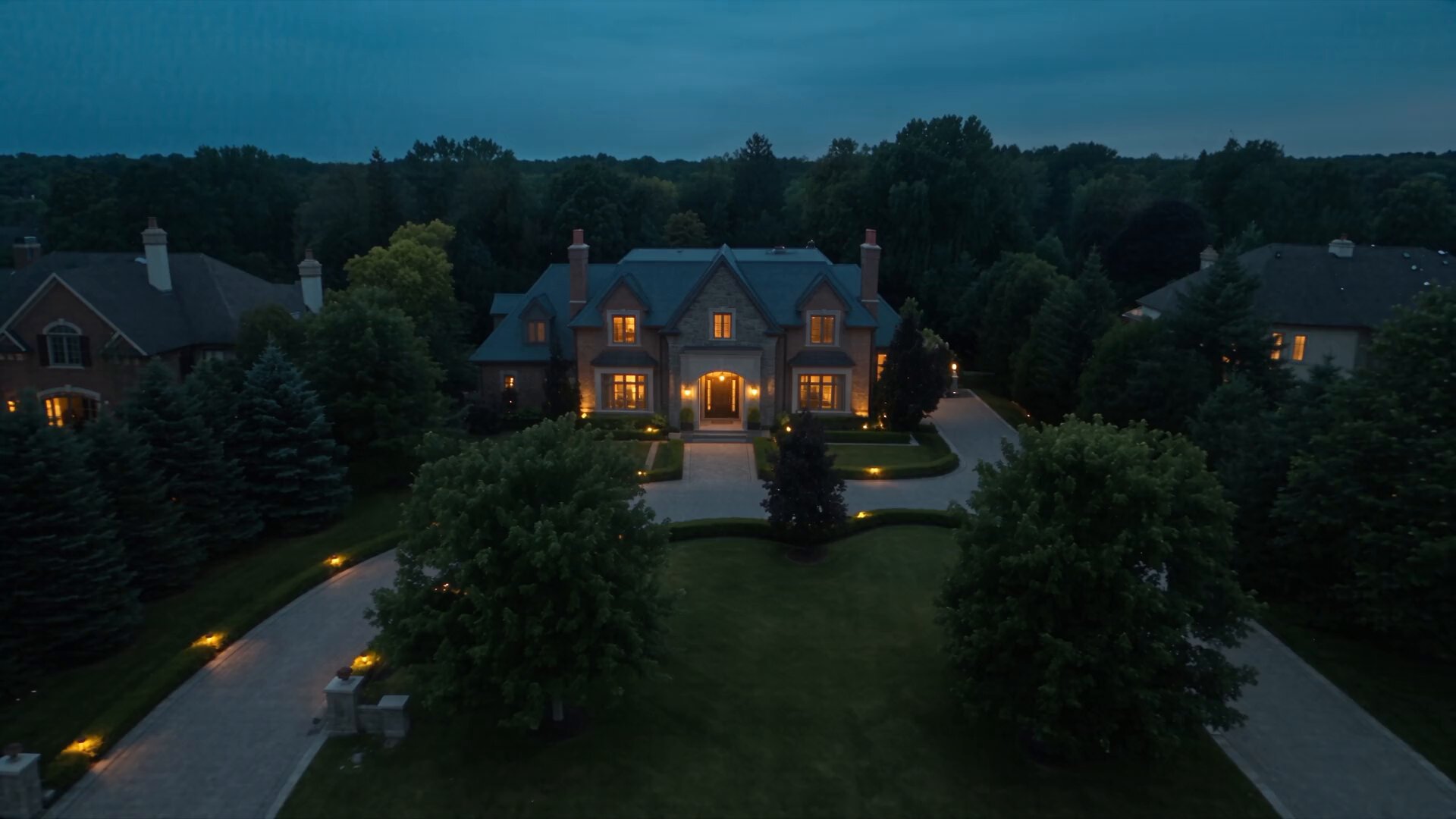 Twilight approach to a luxury Markham estate