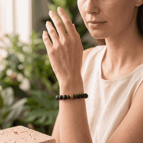 The Tiger Eye Strength Bracelet worn on the wrist