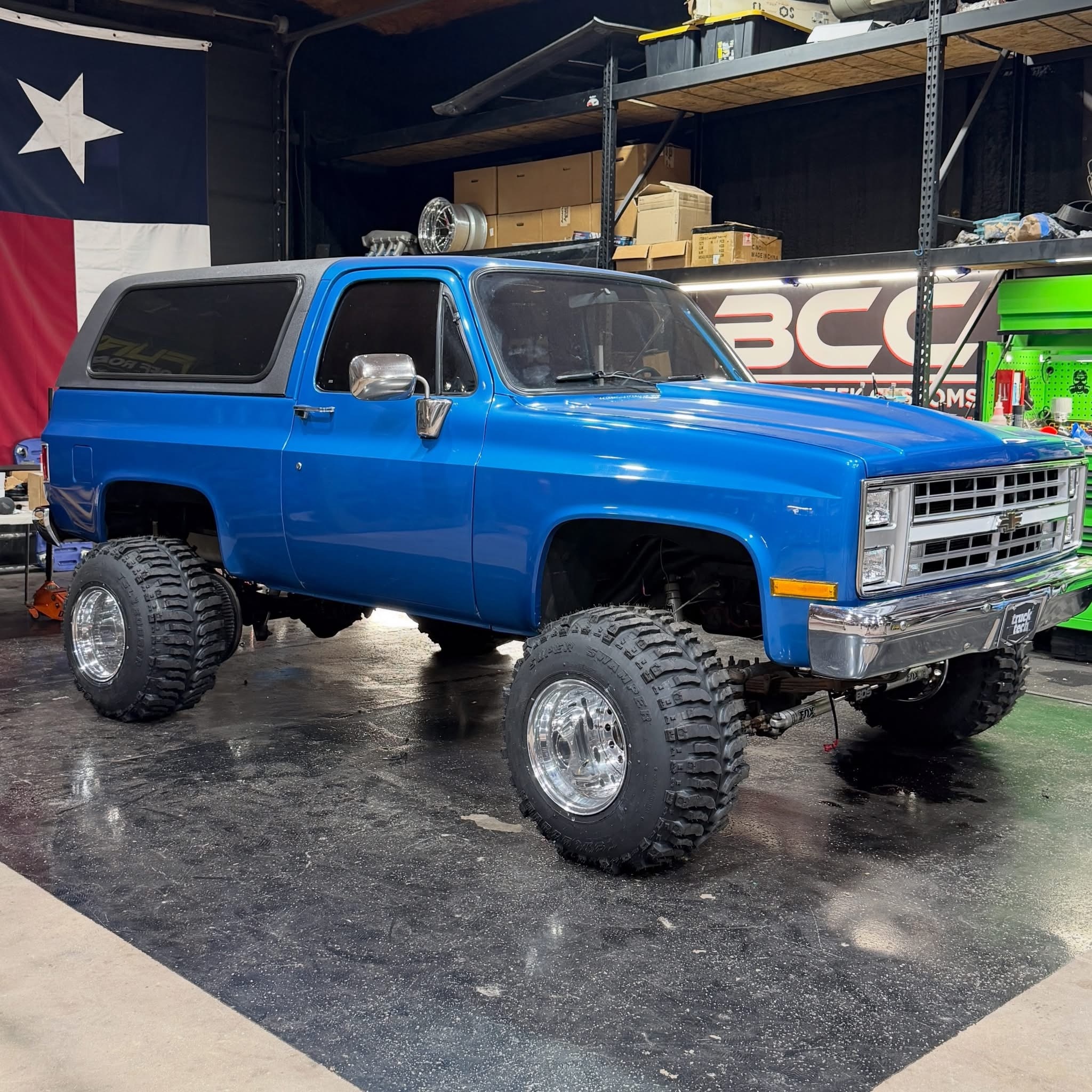 Lifted Chevy K5 Blazer with Shifted Forged Wheels in garage