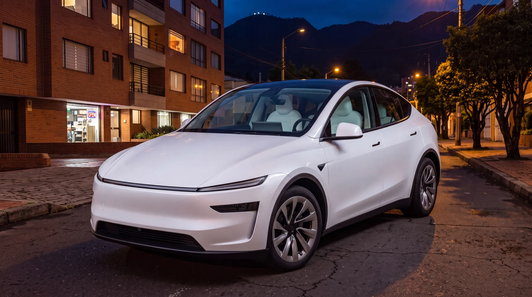 Tesla Model Y de noche — simulación de polarizado, vista exterior