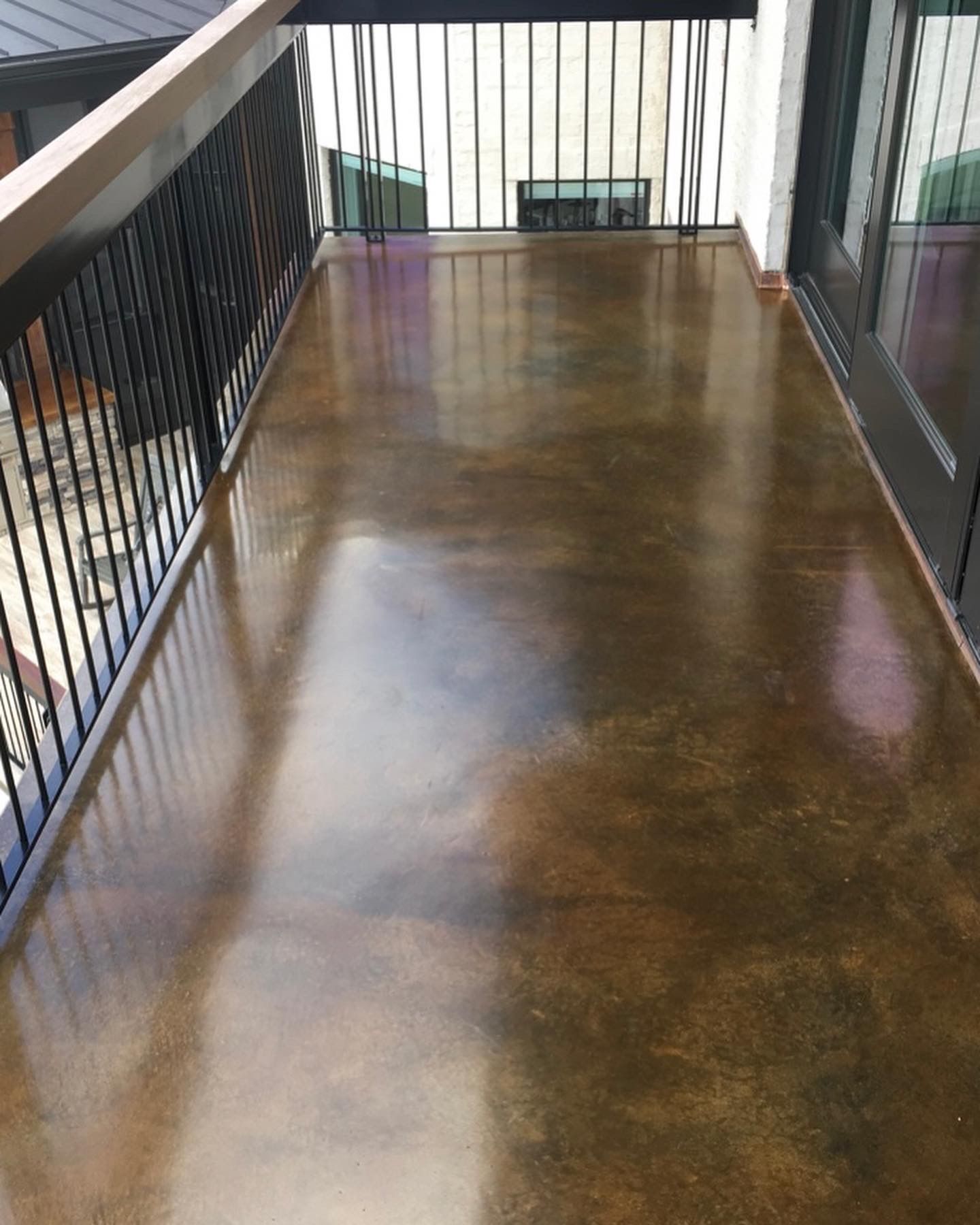 Stained concrete balcony — Upcrete