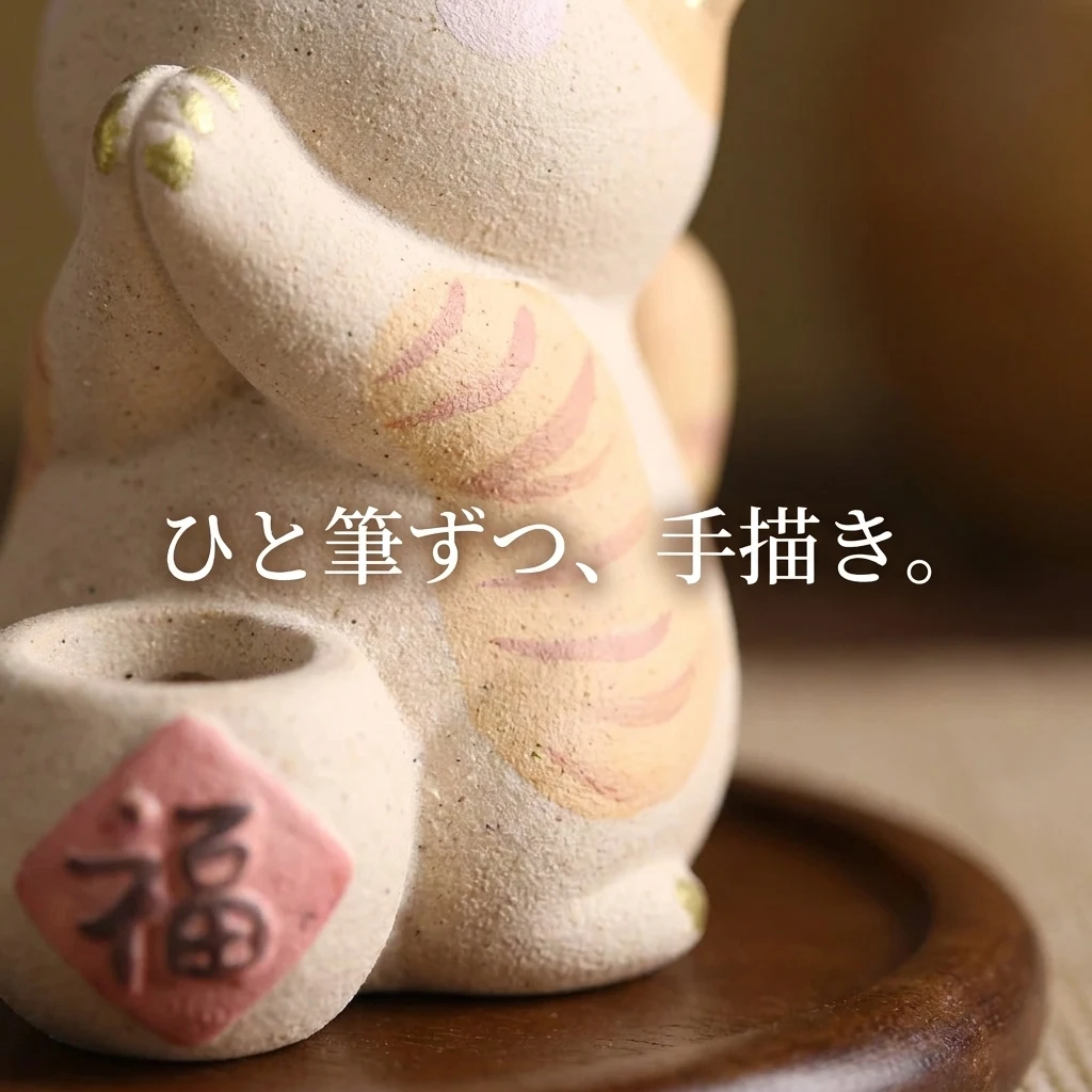 手描きの橘紋と金の耳先、ピンクの福札の質感アップ。