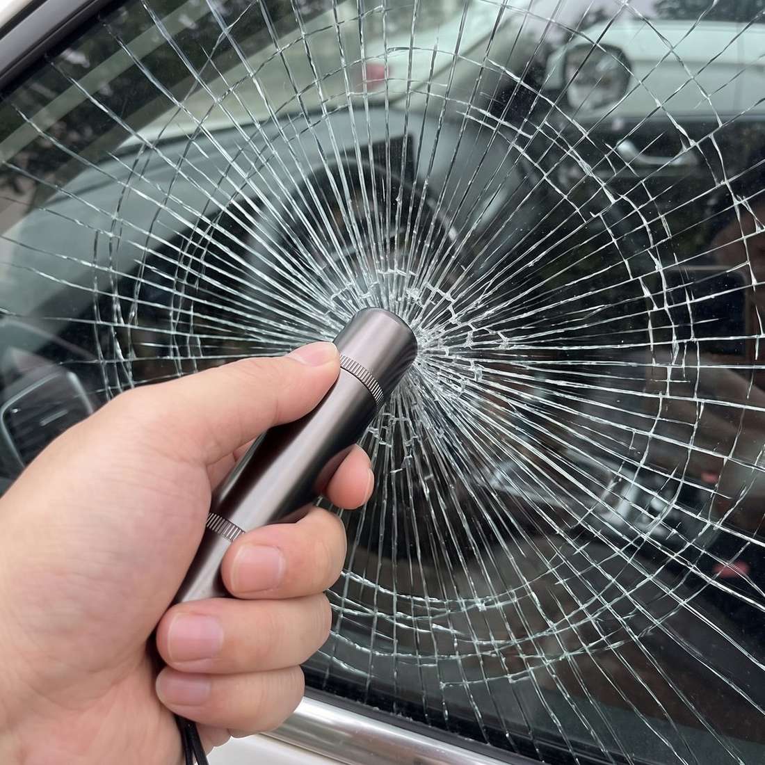 Pressing the striker into a car side window