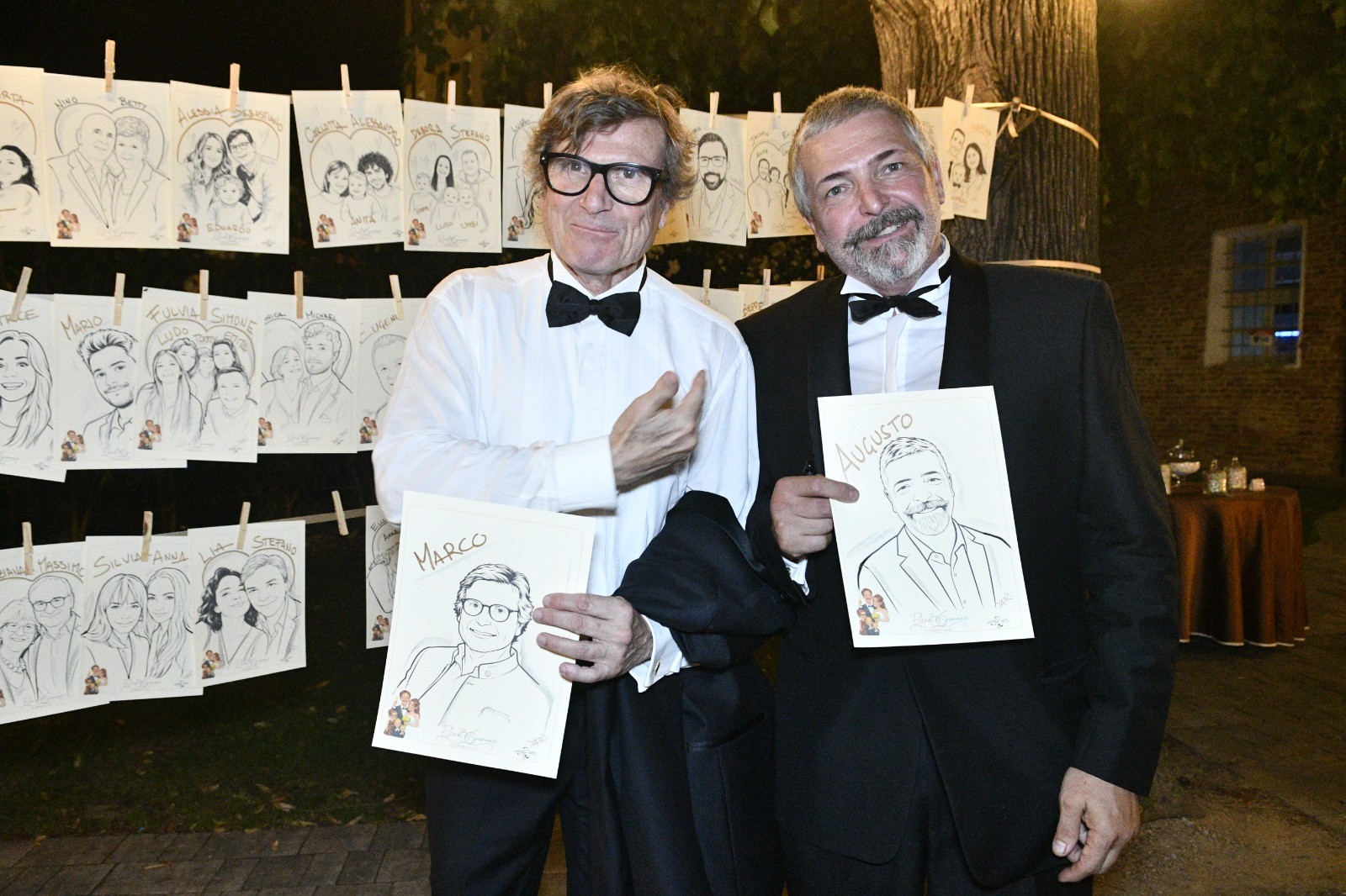 Marco e Augusto ritirano le loro caricature