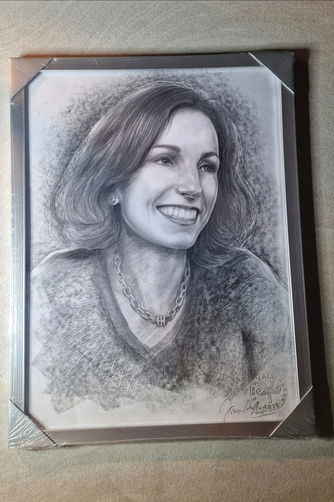 Ritratto a carboncino incorniciato