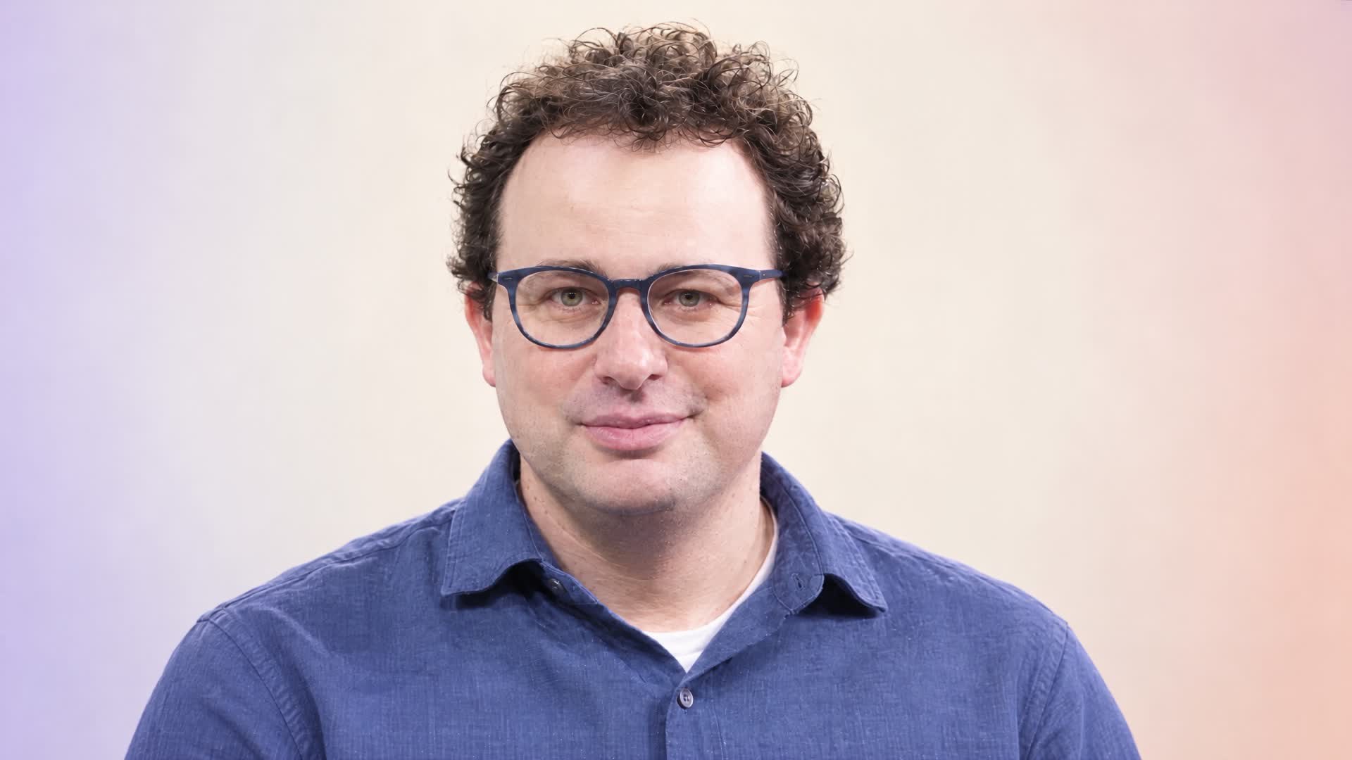Dario Amodei portrait, adapted into a colour study of the AI industry's risk landscape