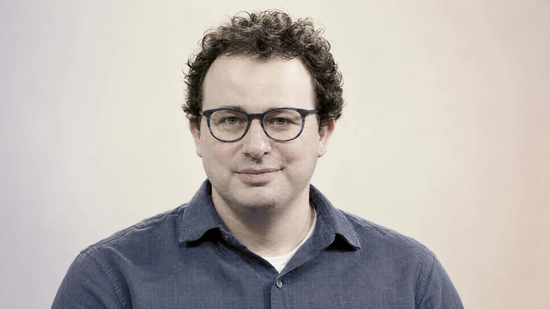 Dario Amodei portrait, adapted into a colour study of the AI industry’s risk landscape