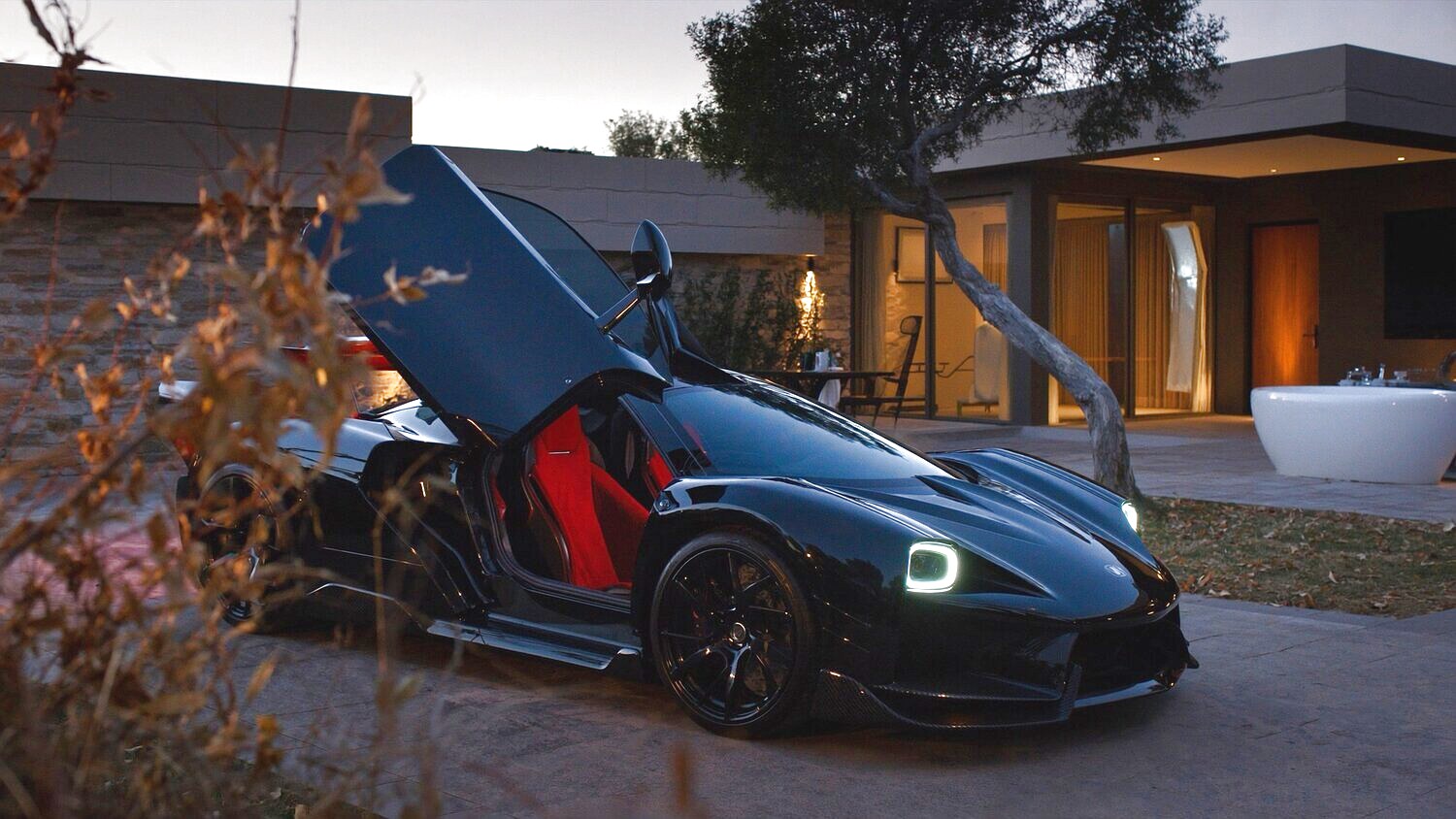 High-end luxury supercar at dusk