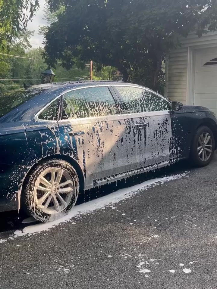 A foamed sedan sitting in a Southborough driveway