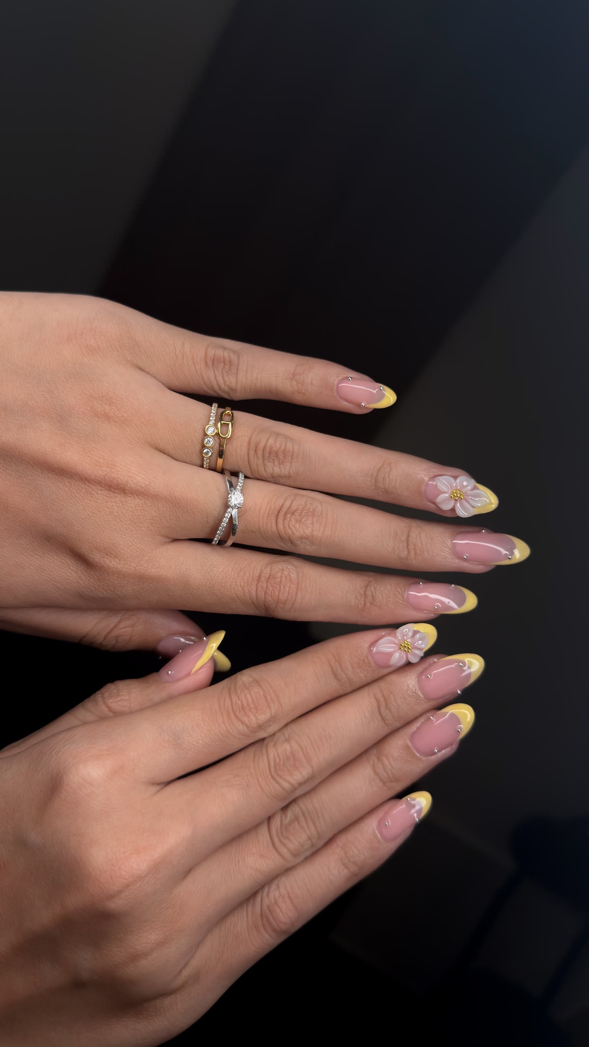 Yellow french tip nails with 3D flower art on a real client — nail art Bali