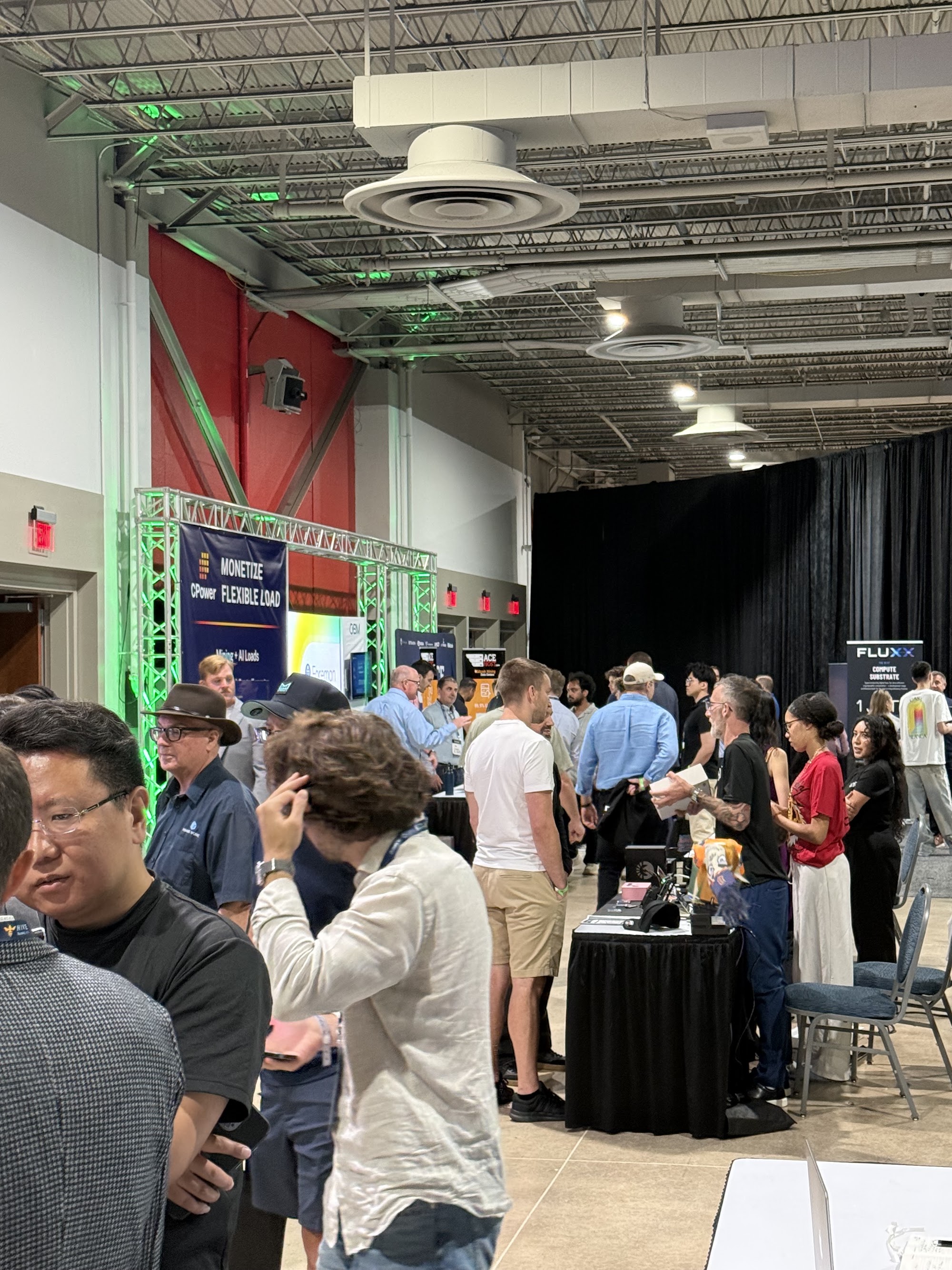 The packed Mining Disrupt 2026 expo floor at the Miami Airport Convention Center