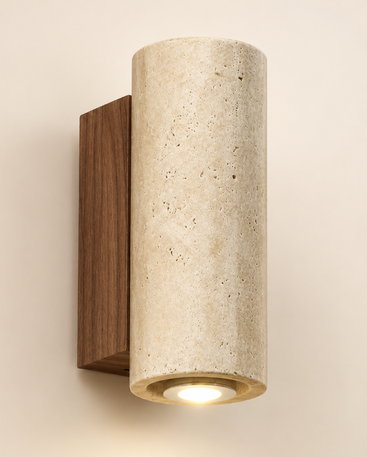 Travertine cylinder sconce on walnut backplate