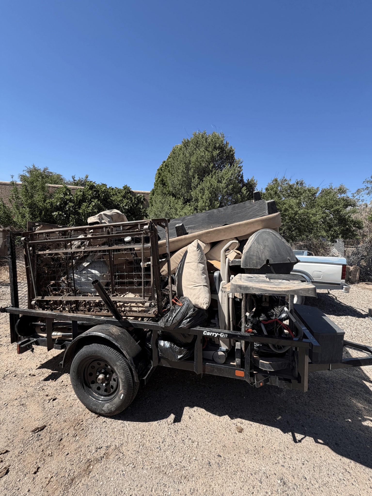 Junk removal trailer loaded