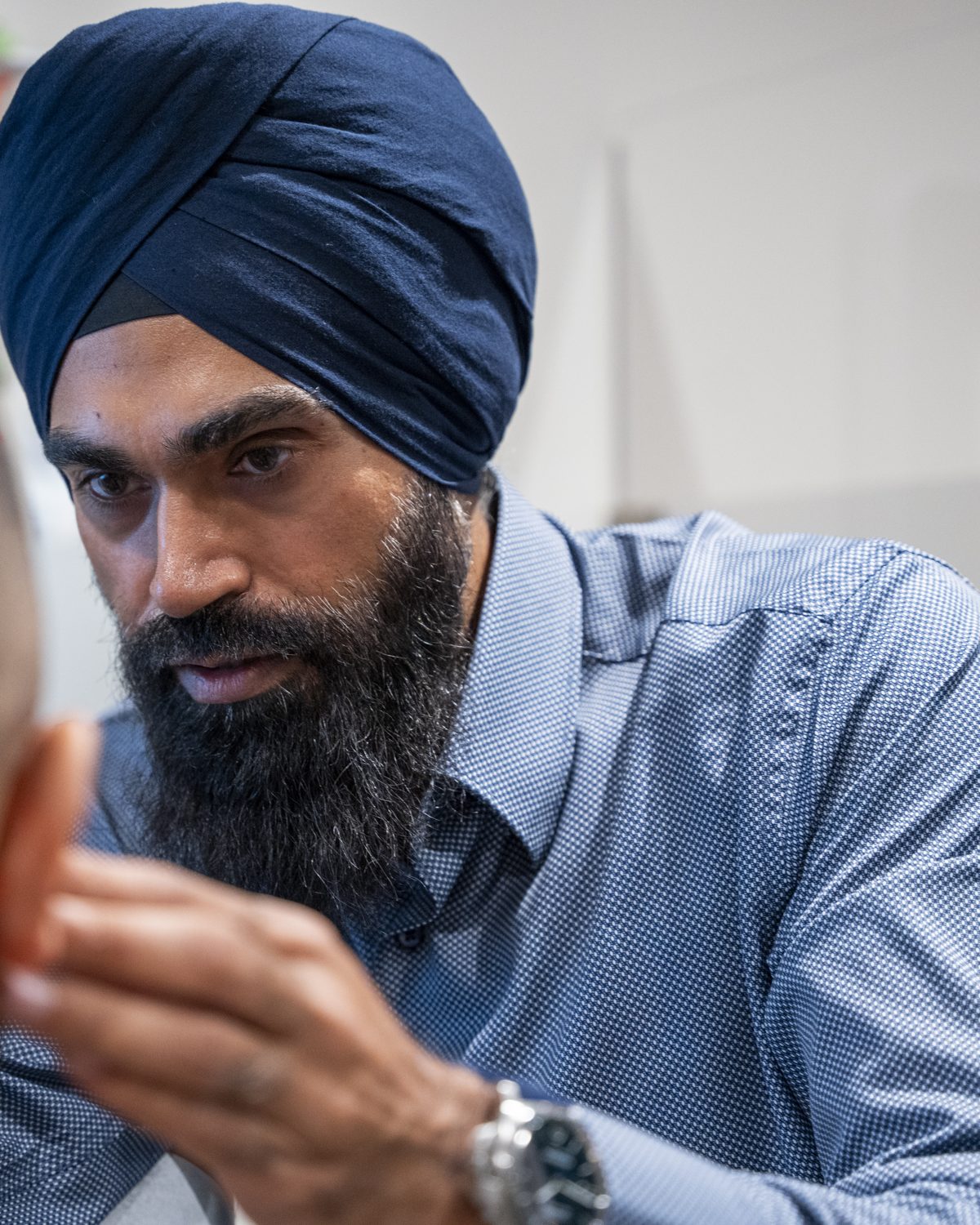 Dr. Manjit Gauba caring for a patient at Divine Spine