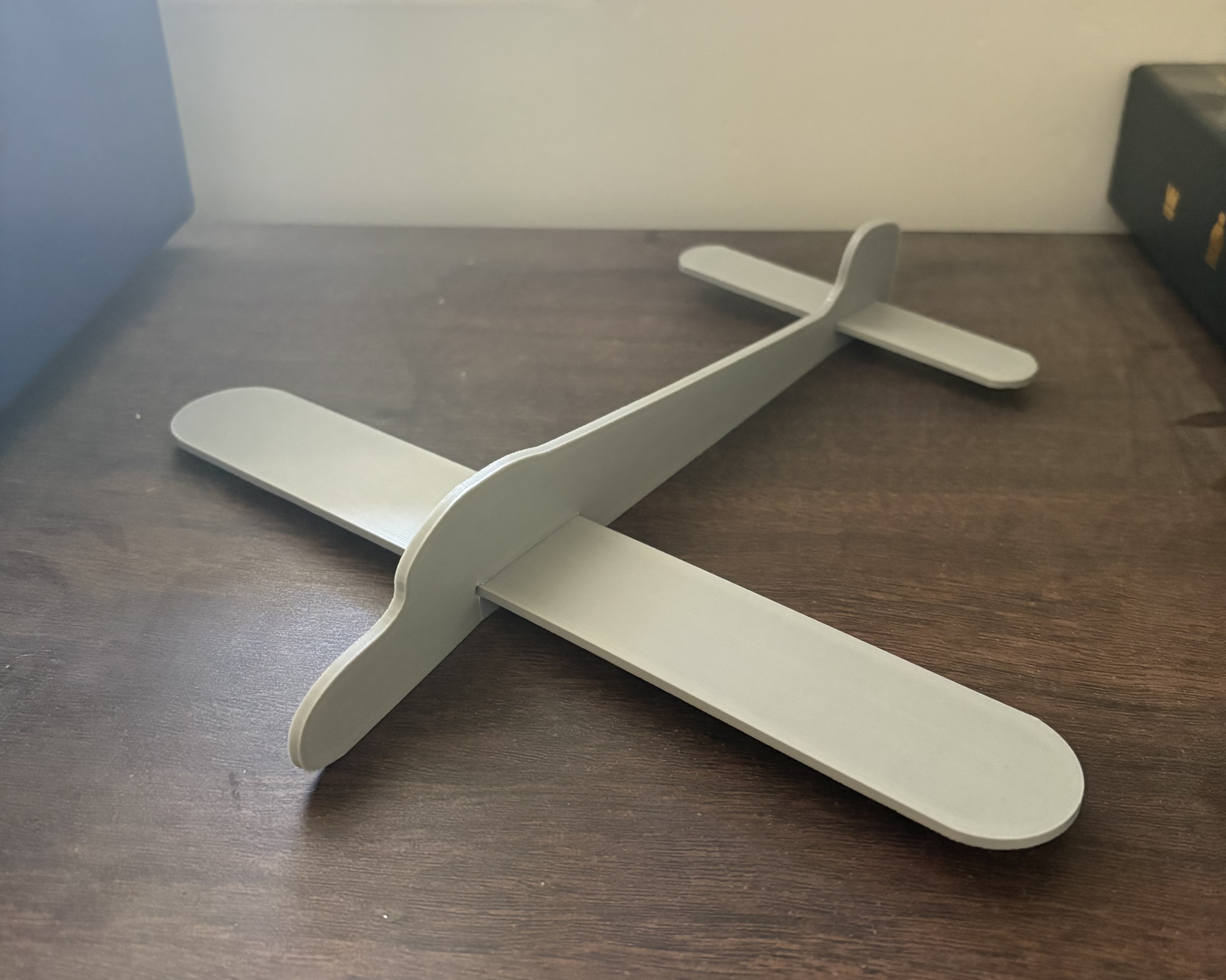 Screen-free STEM airplane project built from recycled GCAGE cardboard cage