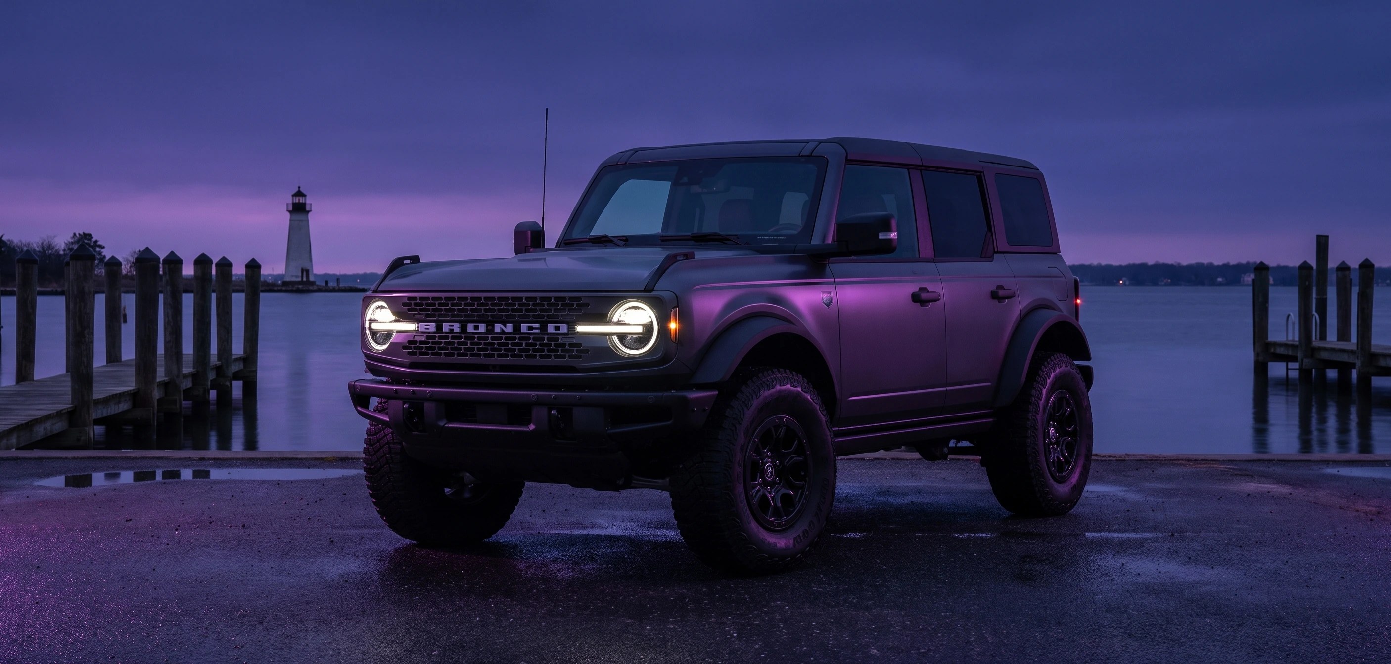 Ford Bronco Badlands at the Keyport NJ waterfront at dusk — Tom’s Ford, 28× Ford President’s Award winner