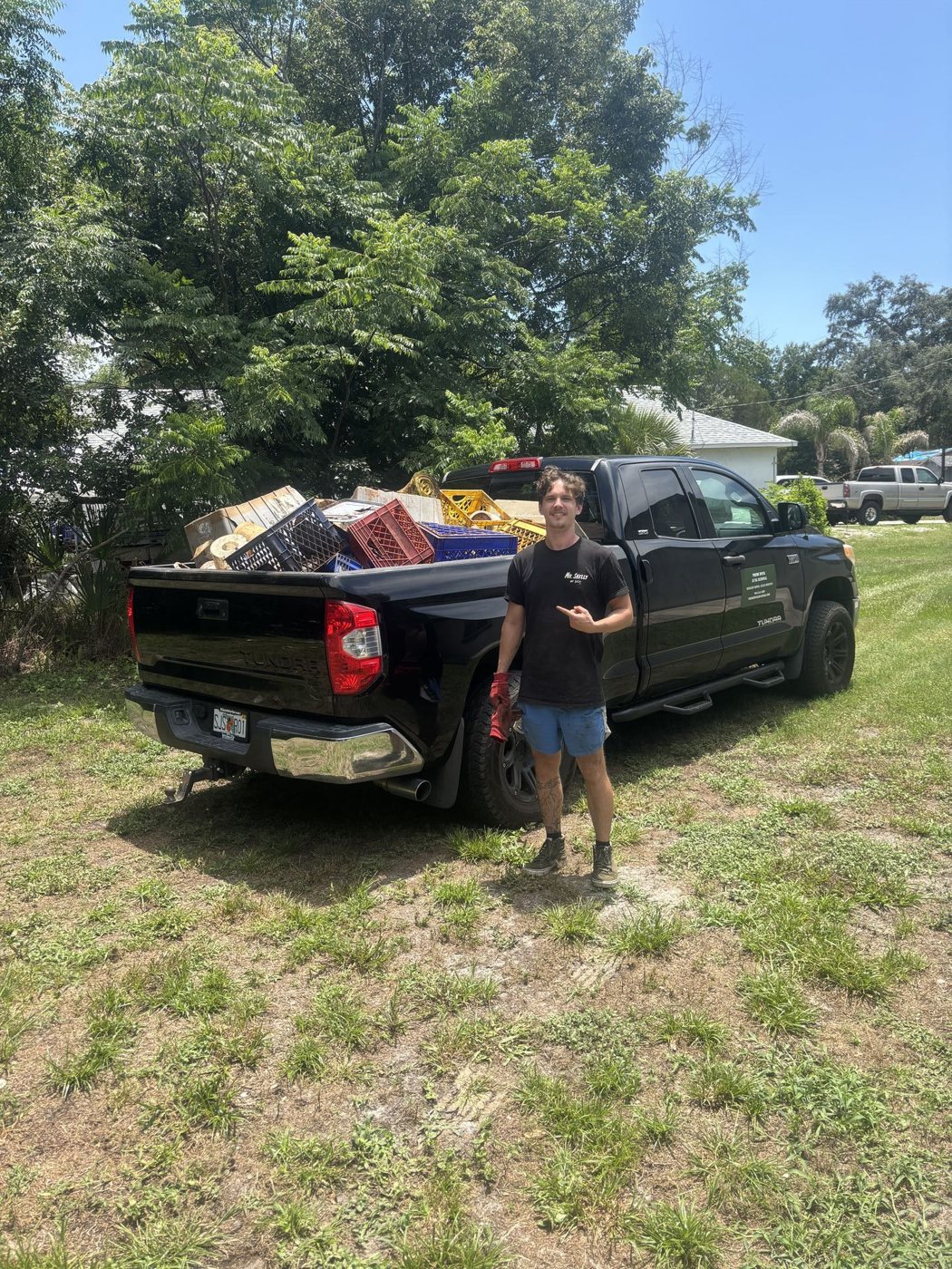 Our crew loading a truck bed after a residential pickup