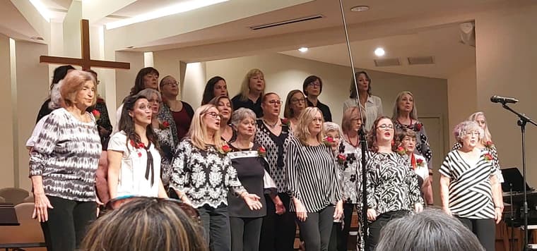 The chorus performing at the Timpoochee show