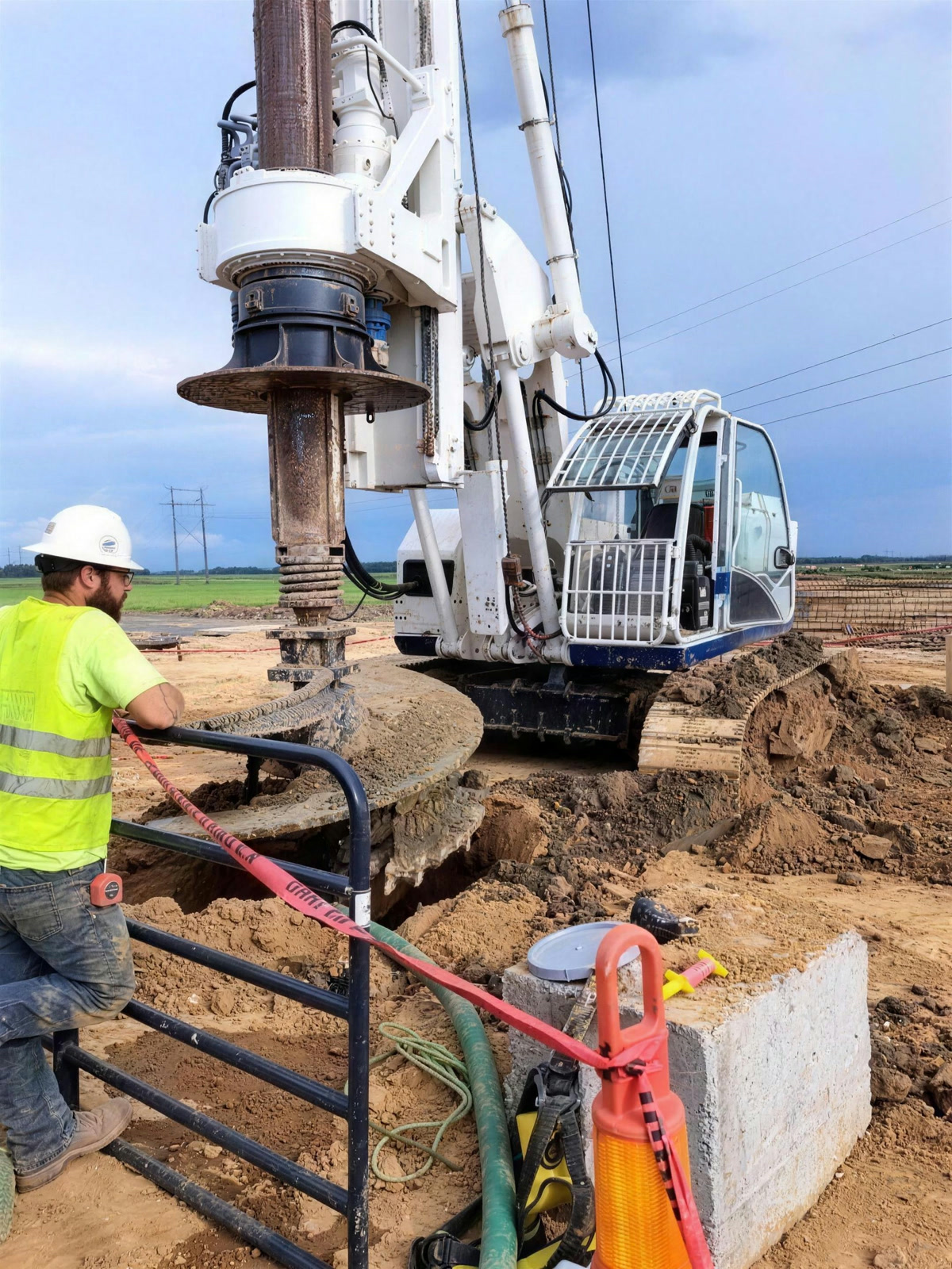 Operator watching the auger advance the shaft