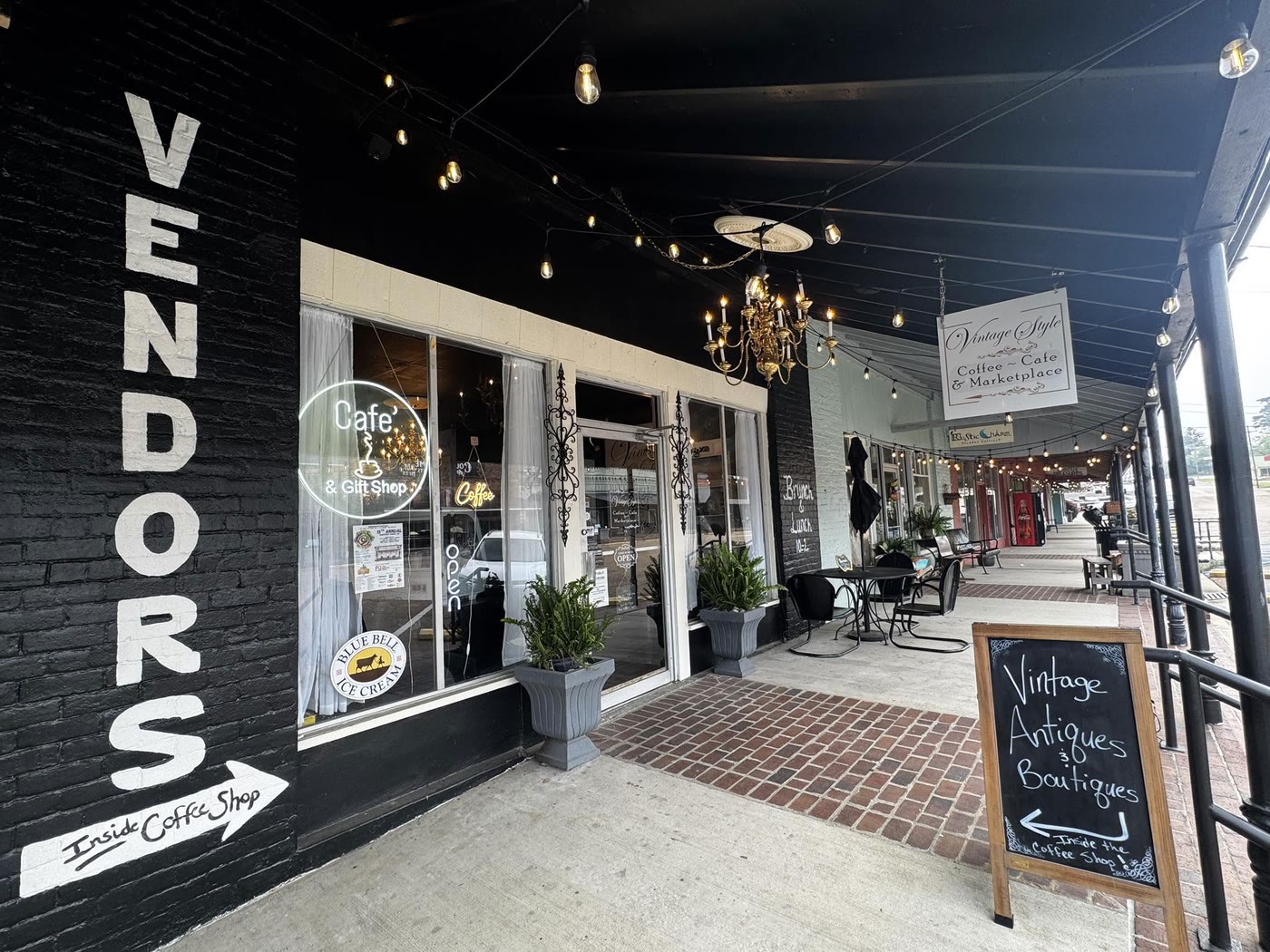 The Vintage Style storefront in downtown Summit, with VENDORS painted on the black brick