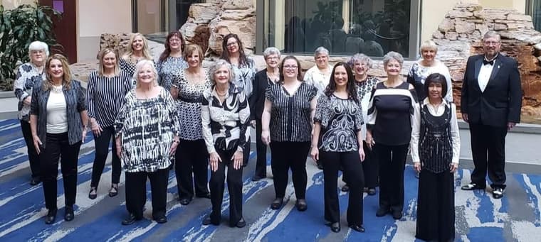 The chorus outside the convention venue in 2023