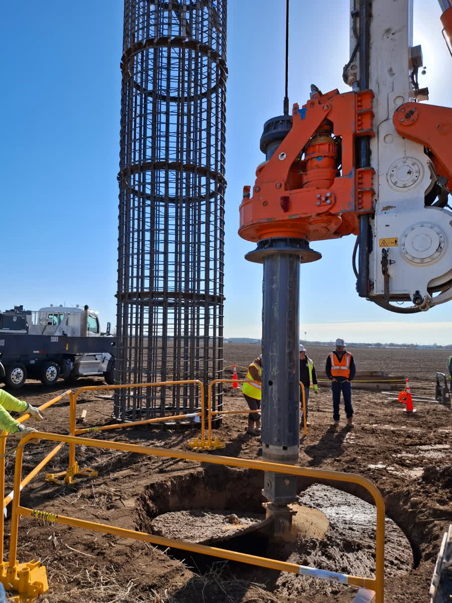 Setting a rebar cage into a drilled caisson