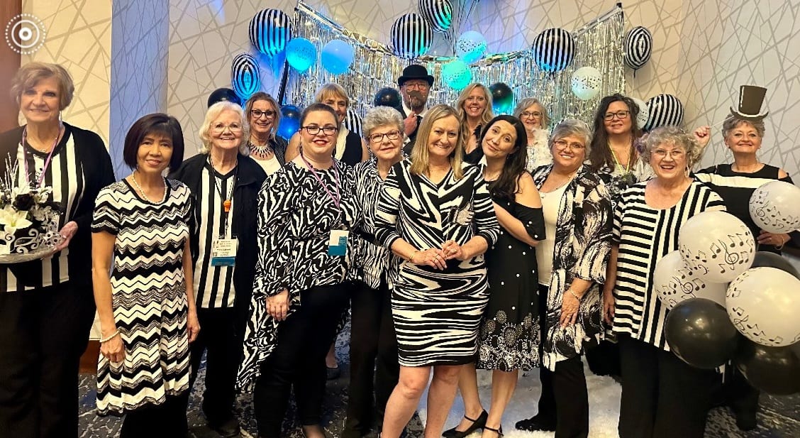 Members of the chorus celebrating together at the Area 6 convention