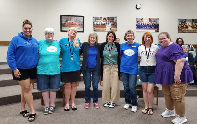 Chorus members standing with the quartet Roulette