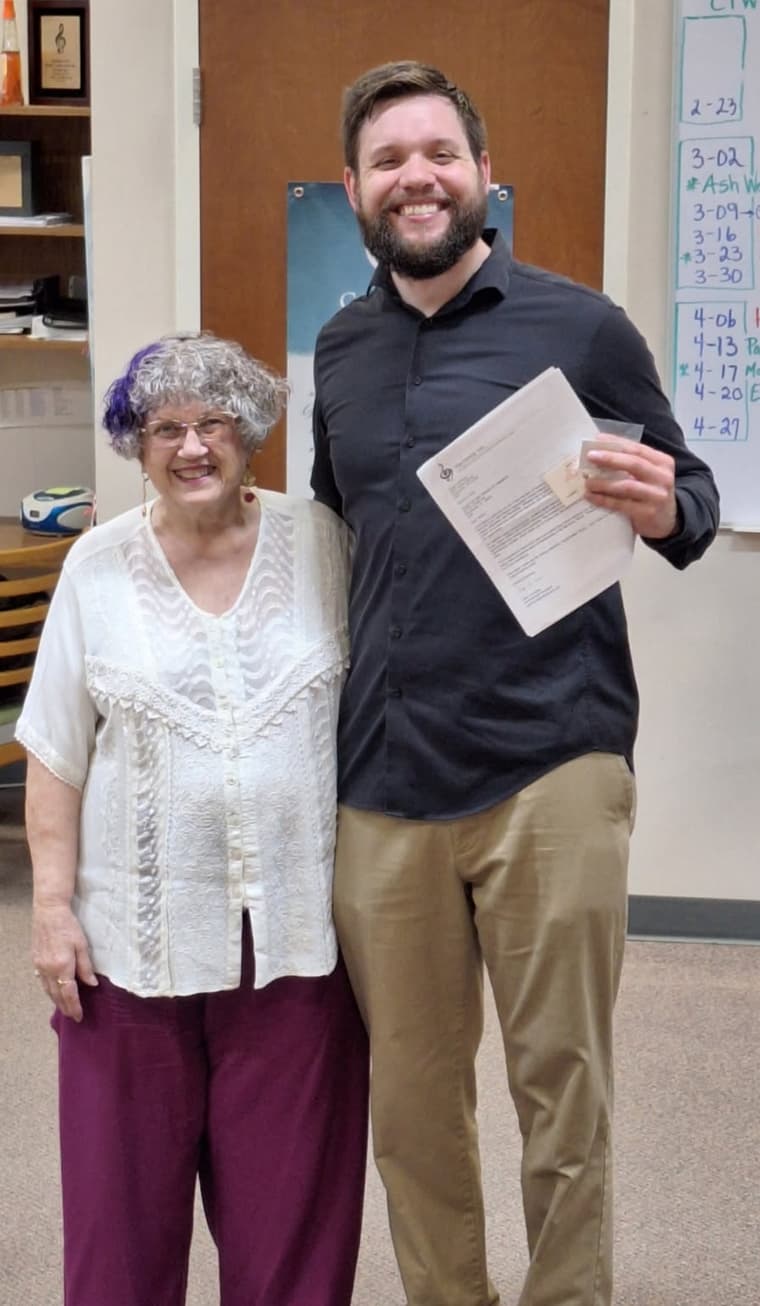 A member and the director holding a certificate