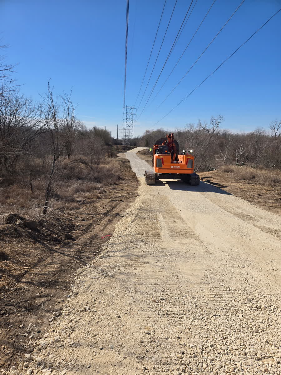 Rig moving down a right of way access road
