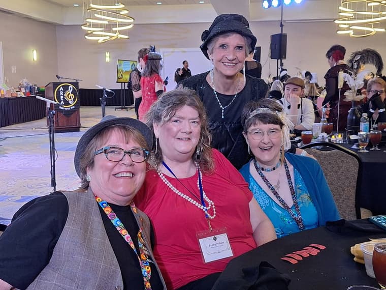 Four members together at the convention dinner