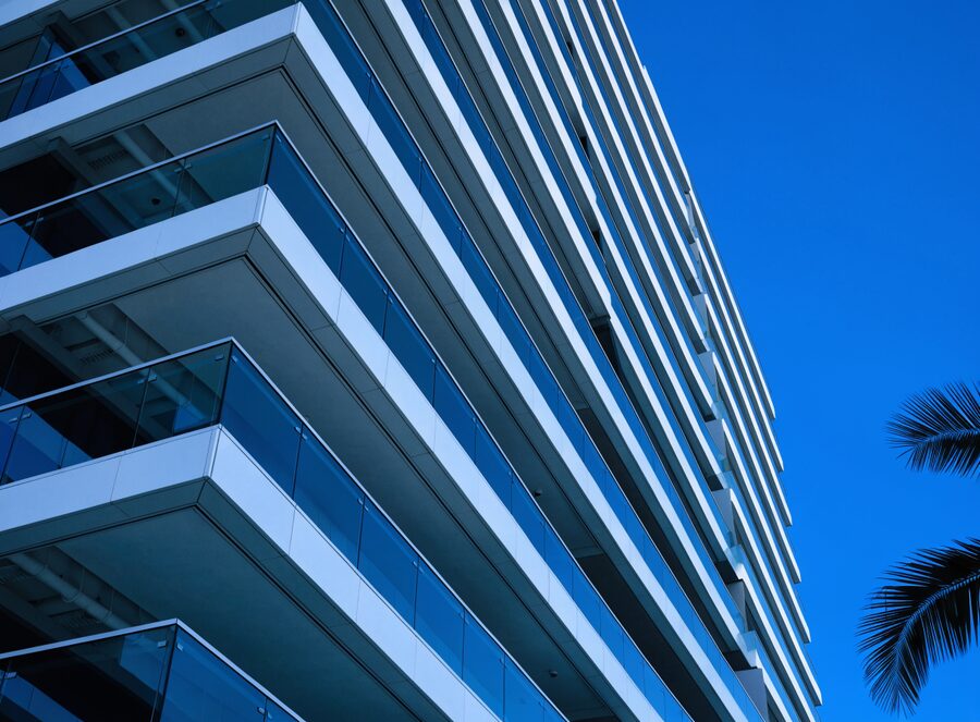 Balconies of a residential tower in Miami against a clear sky