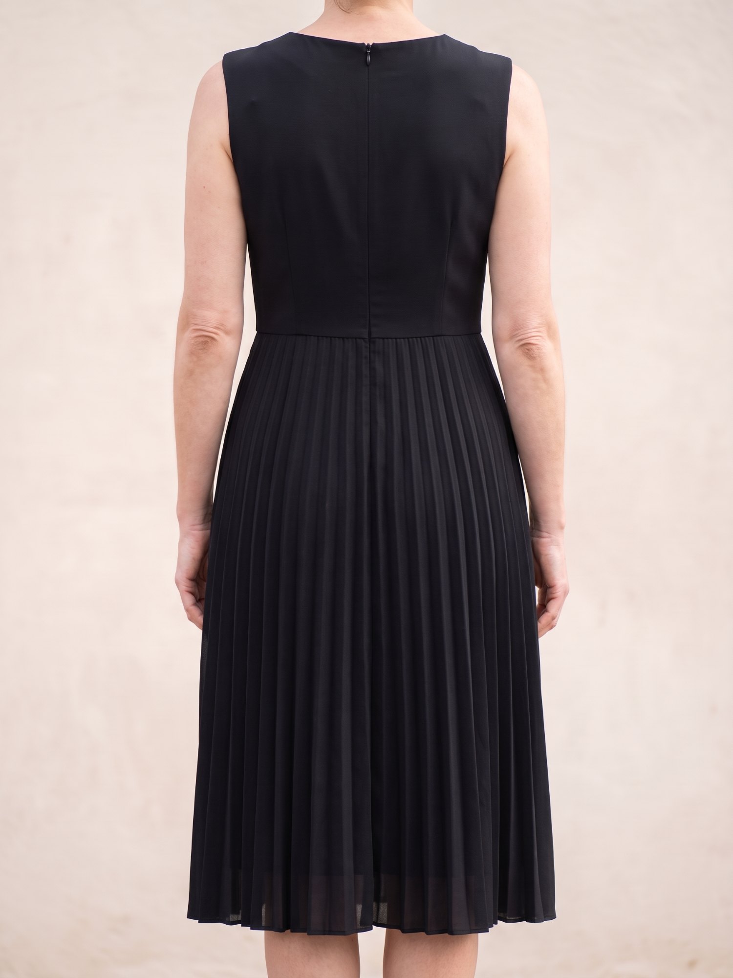 Women's Sleeveless Pleated Midi Dress in Black, back view