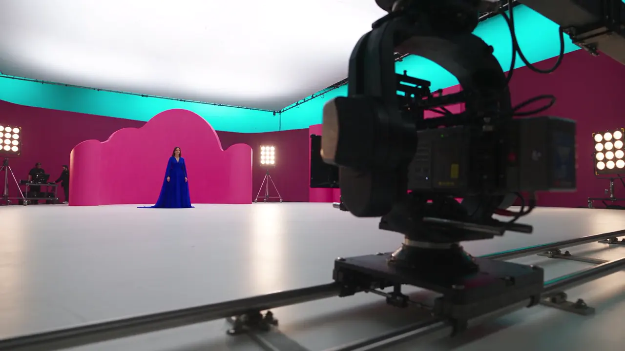 Cinema camera on a colorful production set, an AI concept image