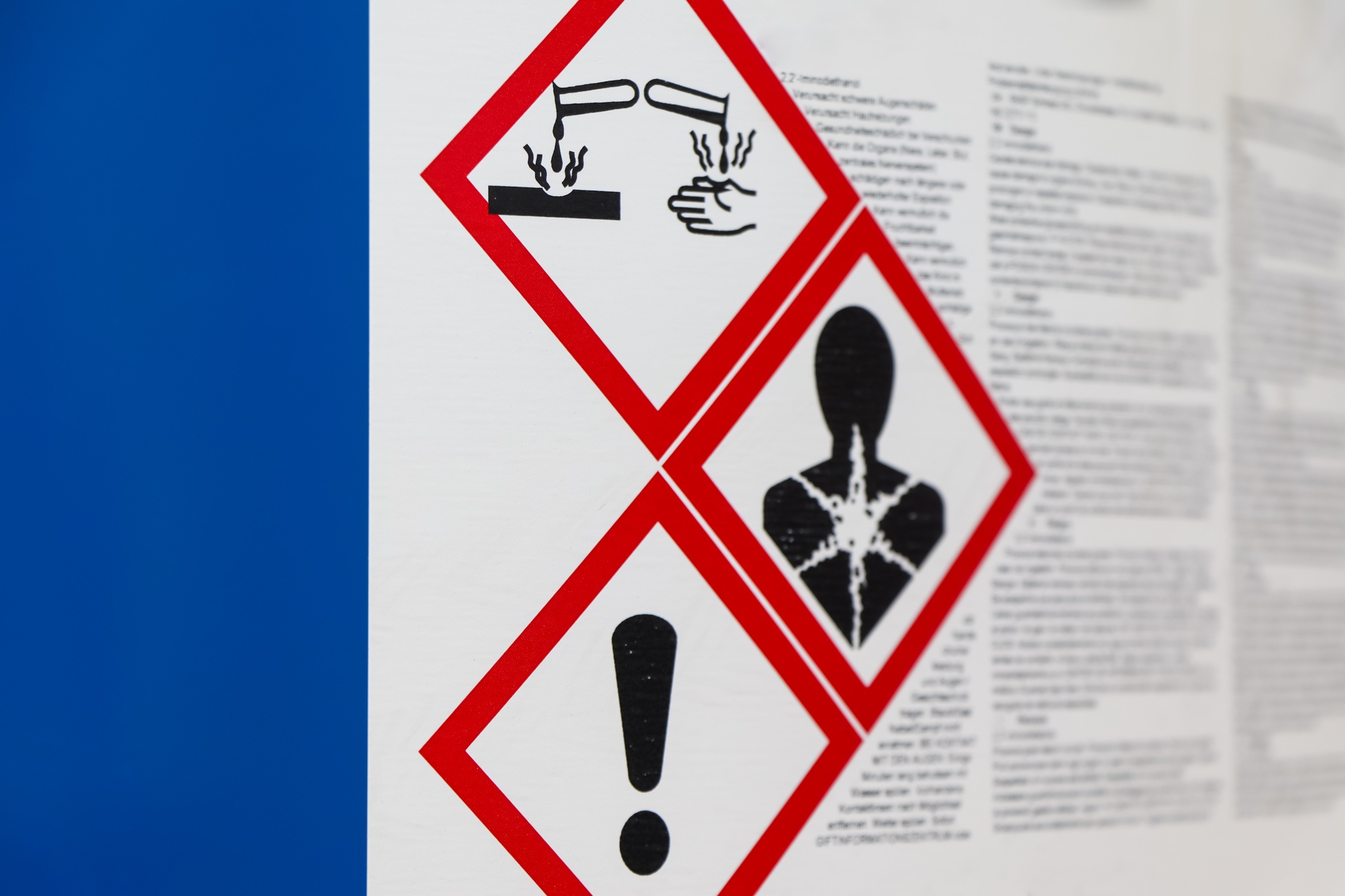 Hazard pictograms beside a safety data sheet