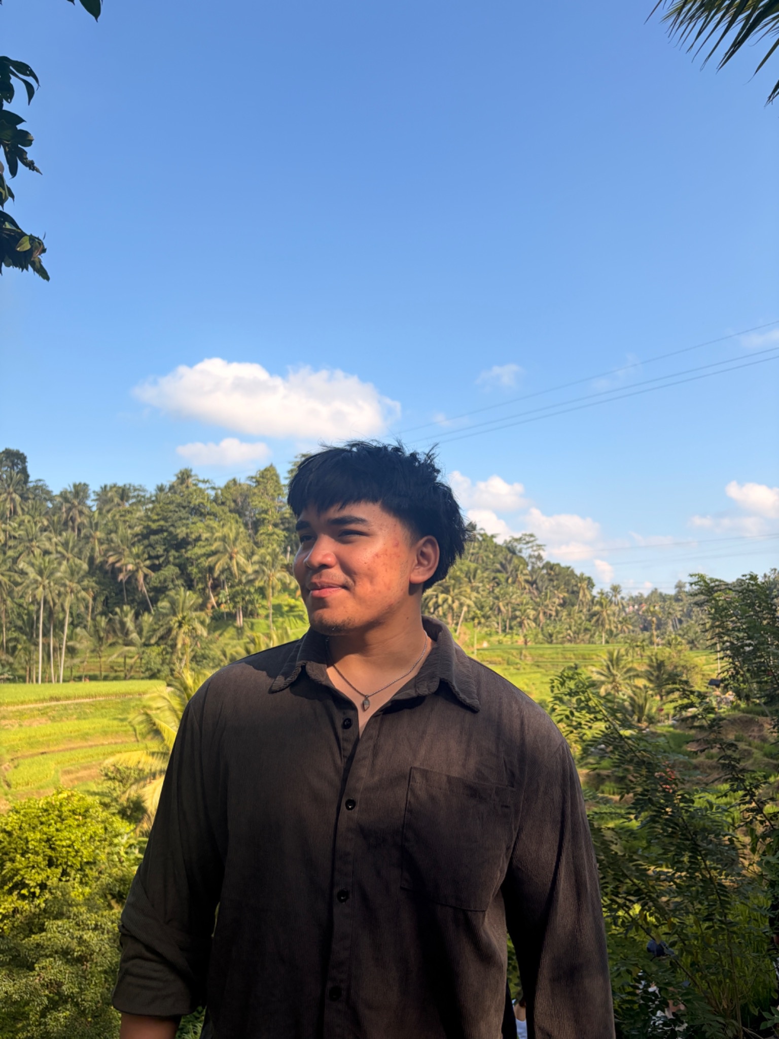 Founder in a black shirt outdoors