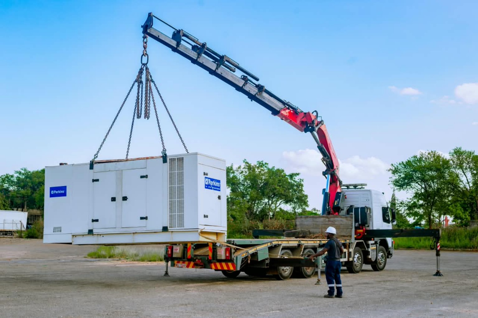 Industrial generator being lifted by a PONK crane